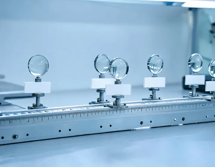 Fit range notes beside unlabeled optical lenses